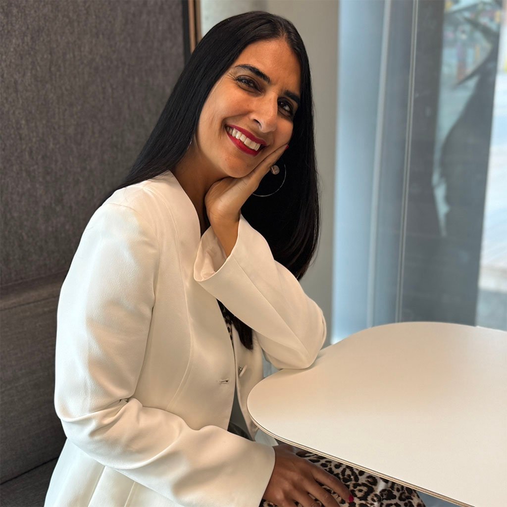 Nadia with hand on side of face